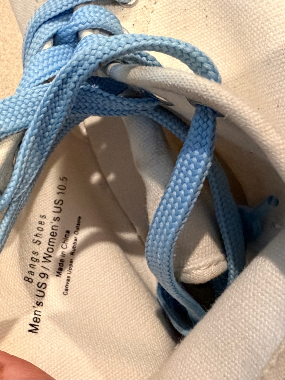 Light Blue Laces on White Canvas Sneakers
